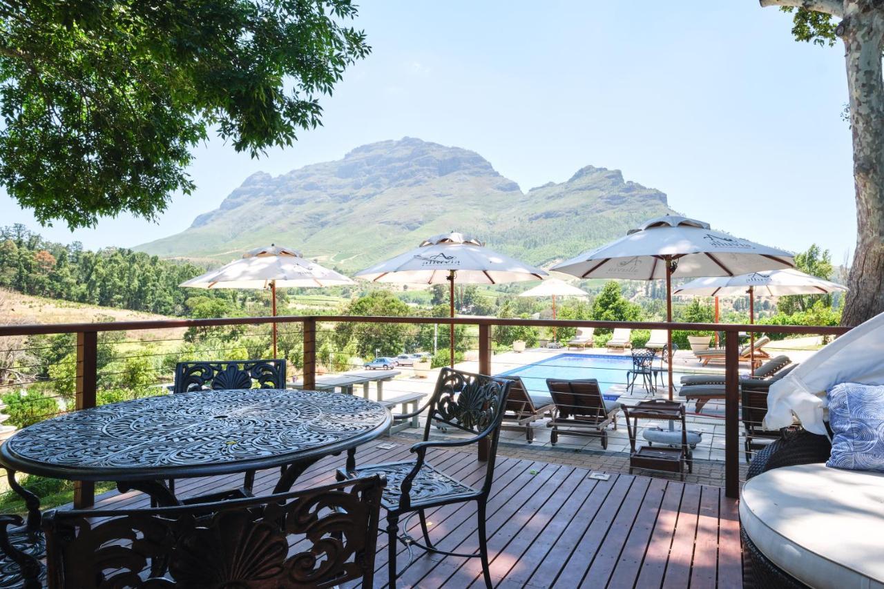 Alluvia Boutique Winery & Luxury Accommodation Стелленбос Екстер'єр фото View of the Three Sisters from the deck of the restaurant at the Boschendal Wine Estate