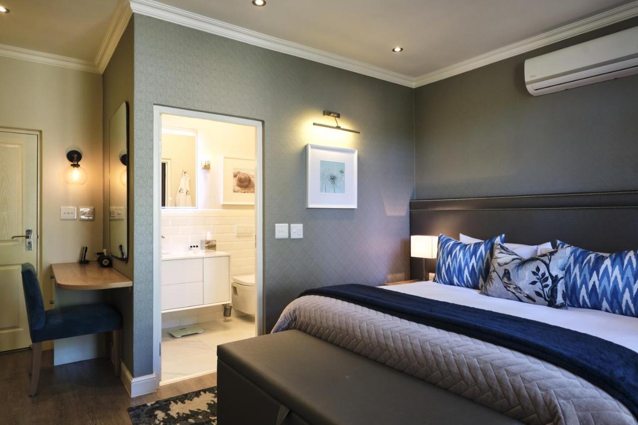Alluvia Boutique Winery & Luxury Accommodation Стелленбос Екстер'єр фото A bedroom at the Oyster Box